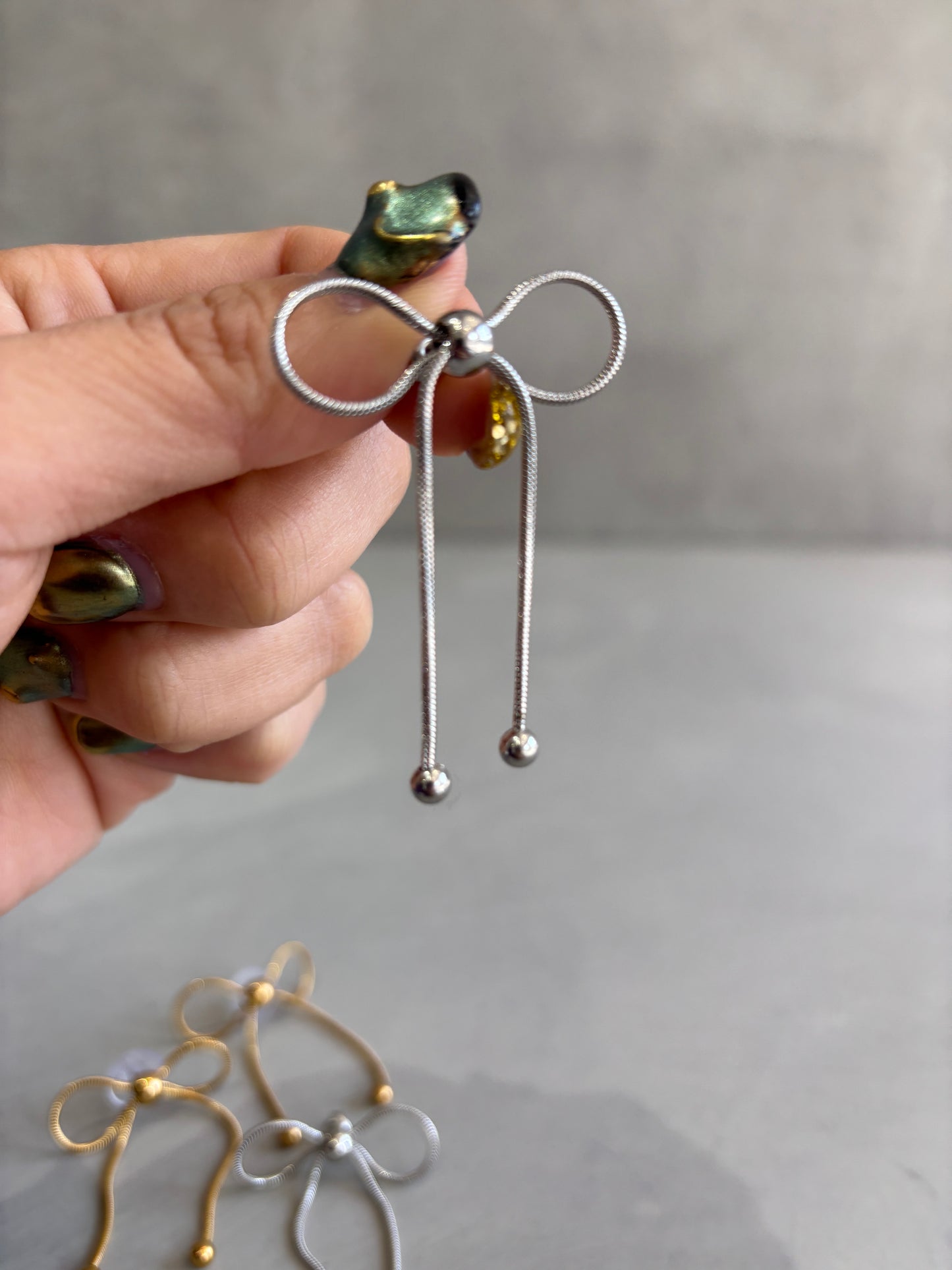 リボンデザインピアス／No.9／BUYING series